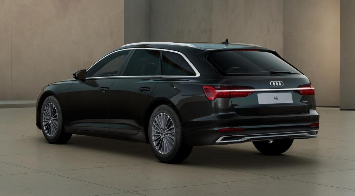 Seitliche Rückansicht eines schwarzen Audi A6 Avant. Technisch generiertes Bild