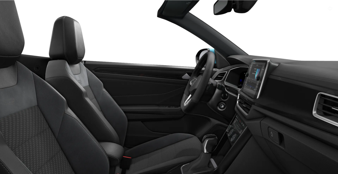 Seitlicher Blick auf Vordersitze und Bordcomputer eines T-Roc Cabriolet R-Line