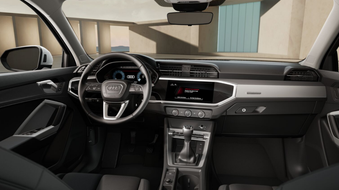 Innenansicht des Q3 Sportback mit Blick auf Armaturenbrett und Mittelkonsole