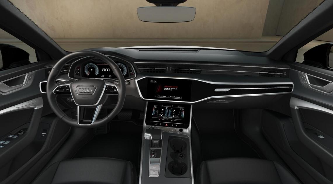 Innenansicht eines Audi A6 Avant. Blick auf Armaturenbrett und Mittelkonsole. Technisch generiertes Bild